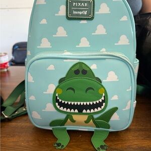 Loungefly Pixar Toy Story Dinosaur Backpack - Light Blue and Green